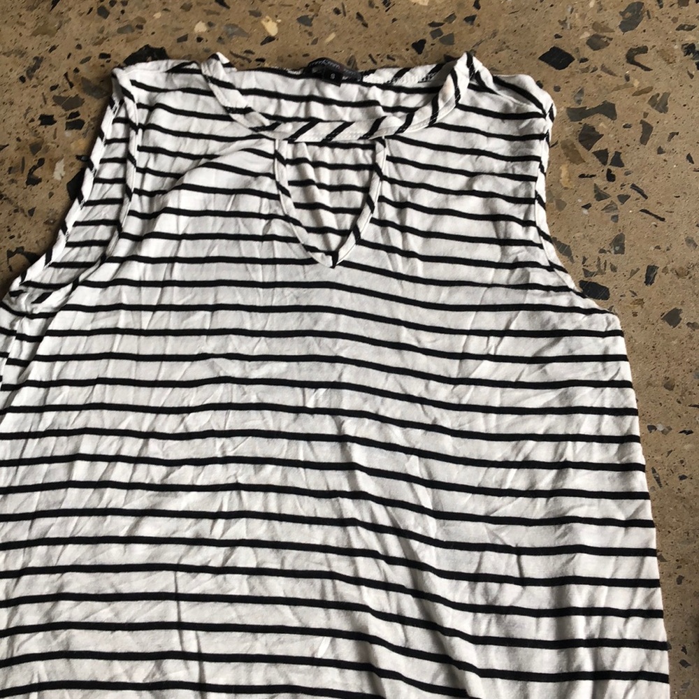 A white tank top with black Stripes